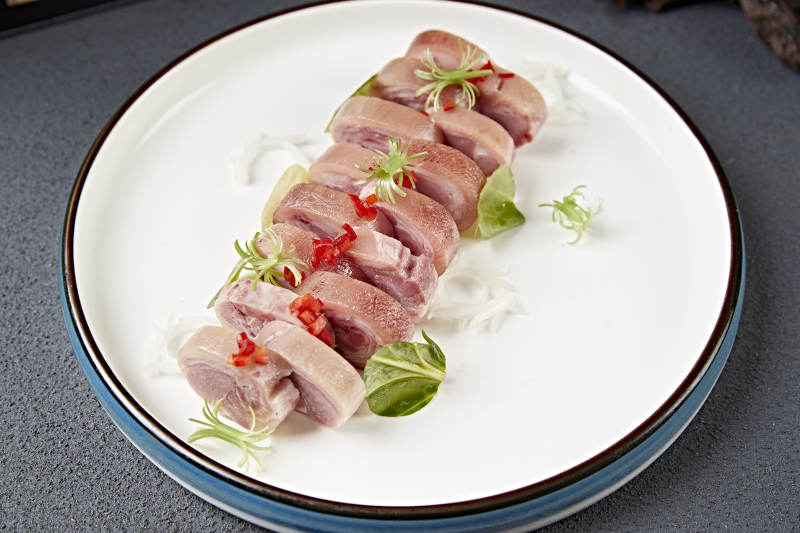 卤味压猪肘花卷切片图片