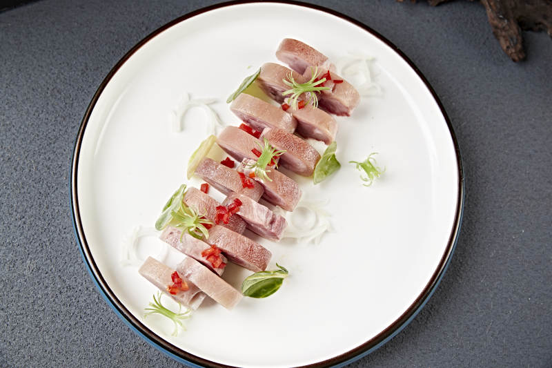 卤味压猪肘花卷切片图片