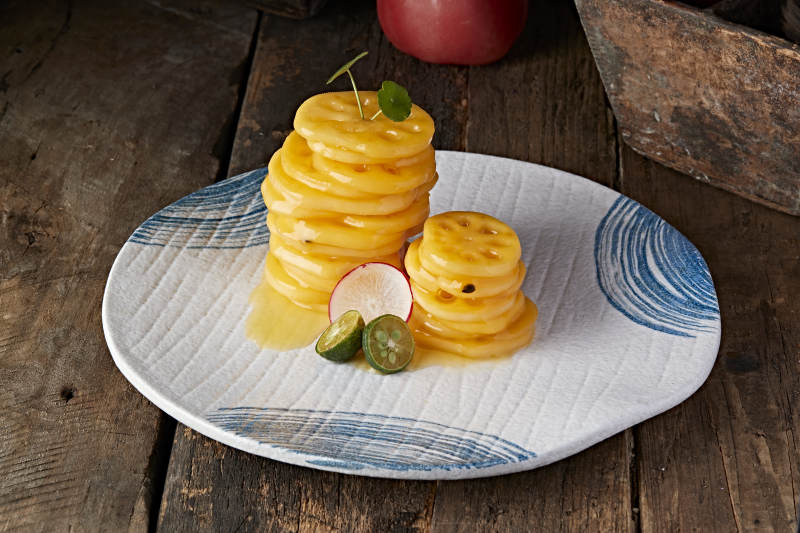 腌制橙汁甜蜜藕片图片