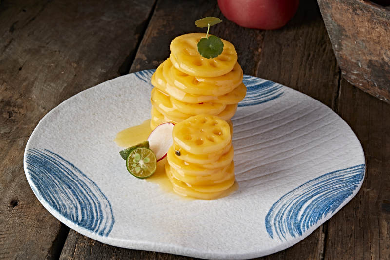 腌制橙汁甜蜜藕片图片