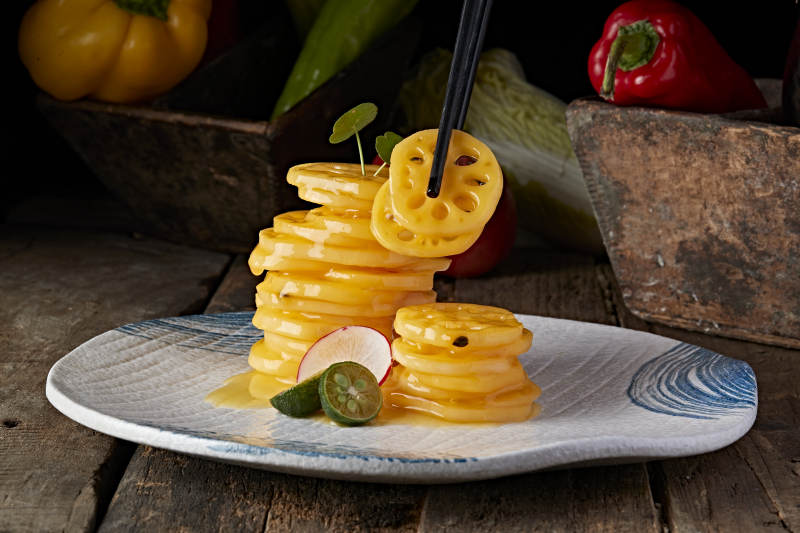 腌制橙汁甜蜜藕片图片