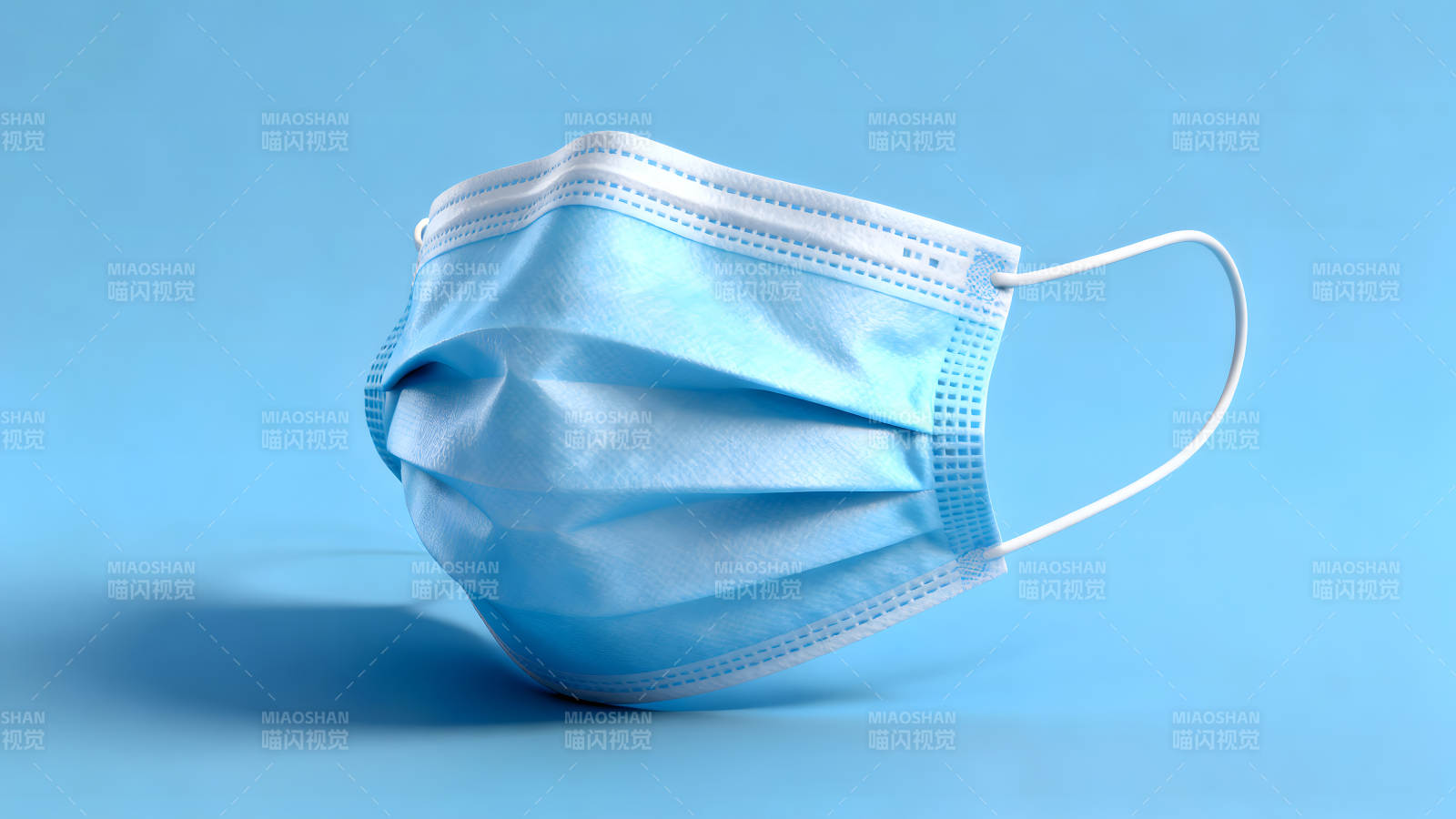 蓝色口罩特写医疗防护用品展示图片