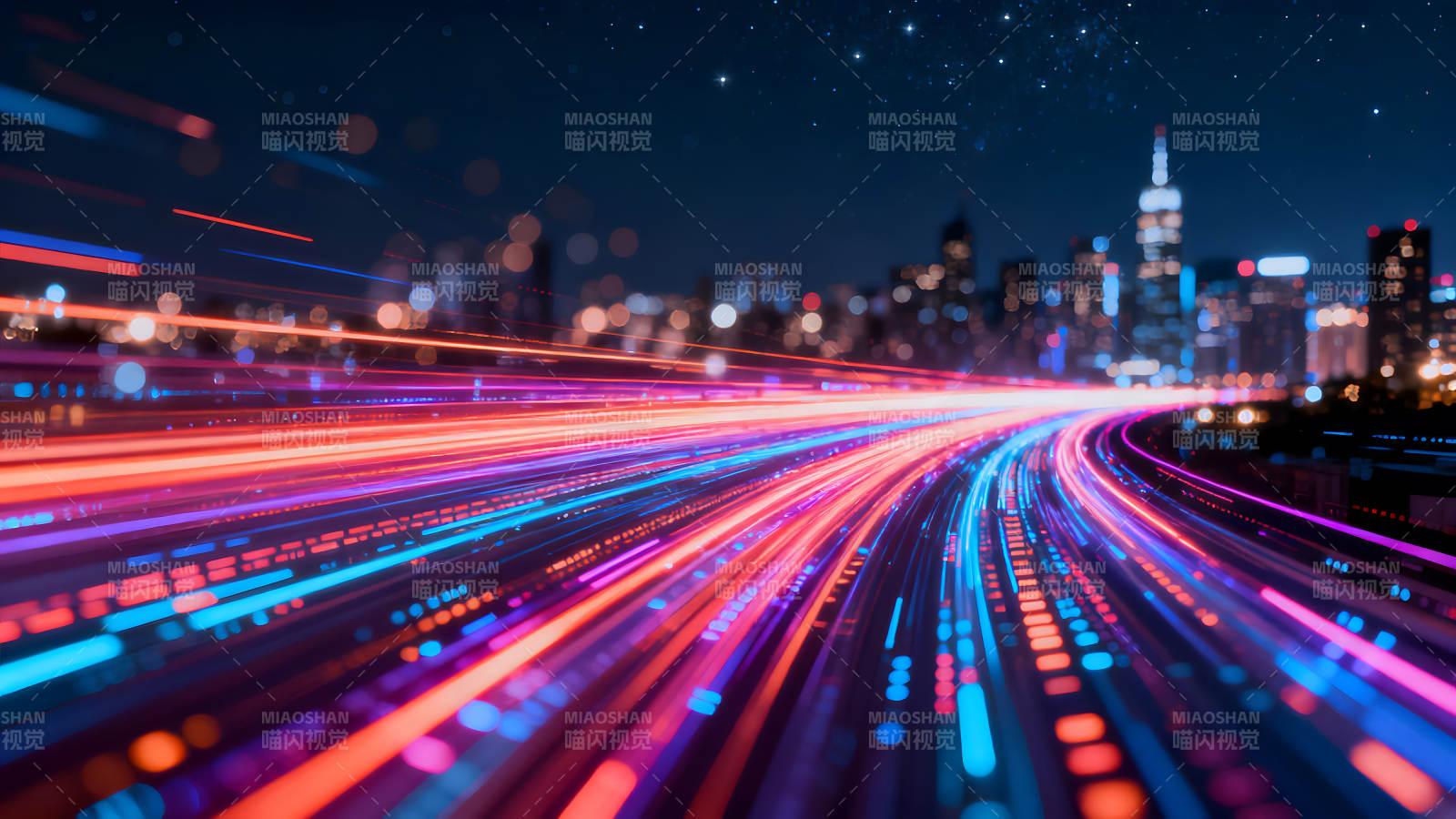 夜幕下城市光轨的绚丽景象图片