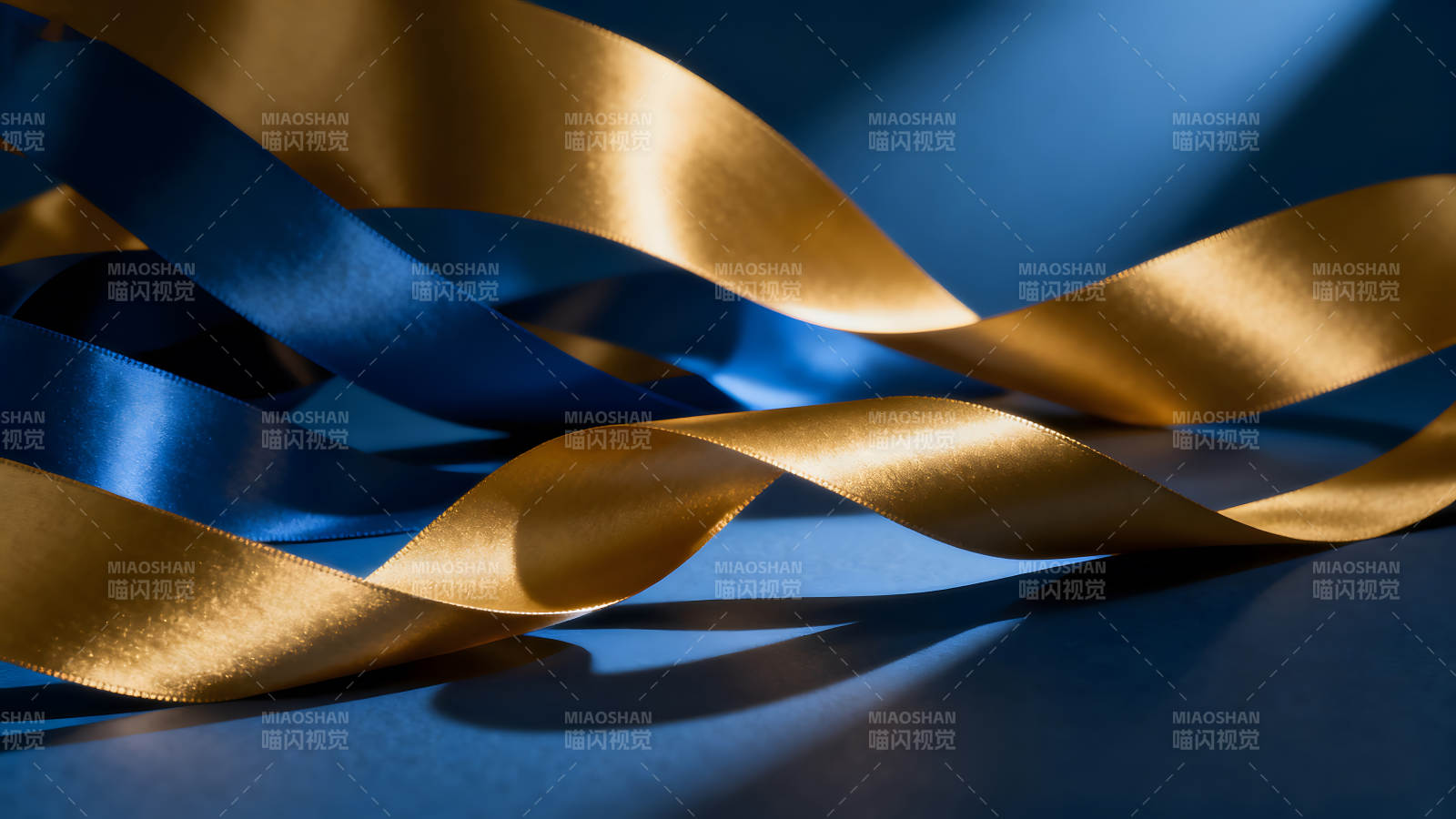 金蓝丝带交织光影图片