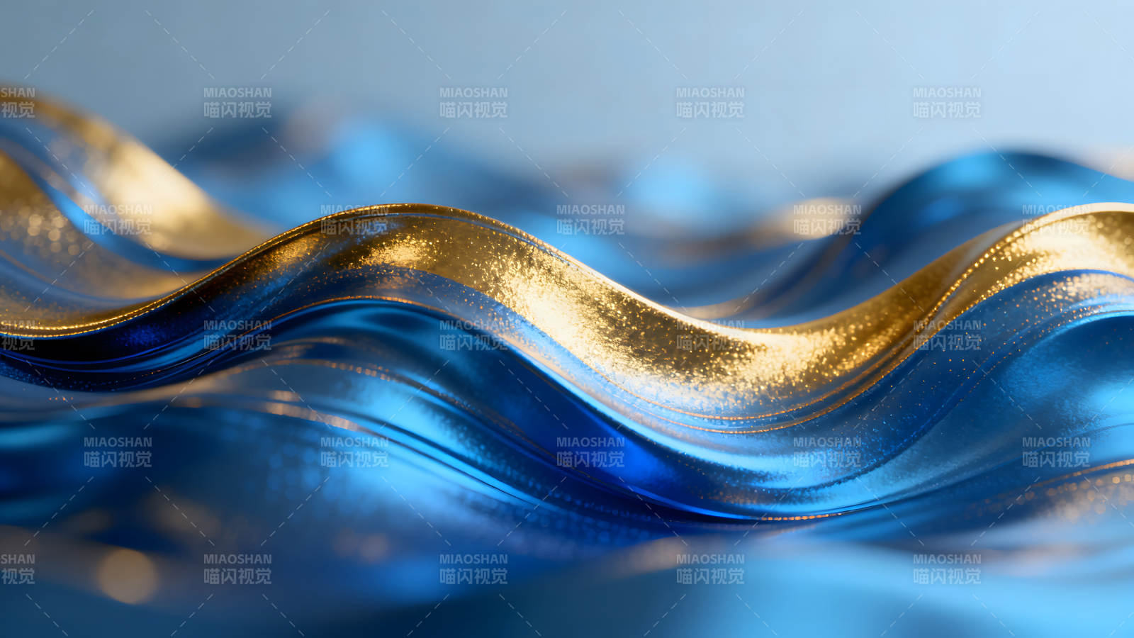 金色蓝色绸缎的抽象波浪图片