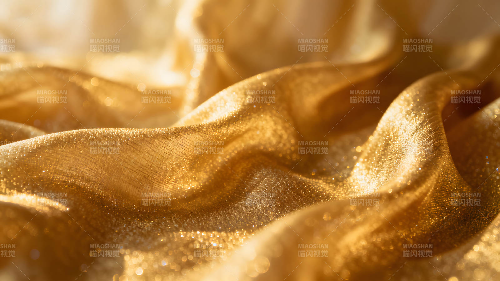 金光闪耀的褶皱绸缎图片