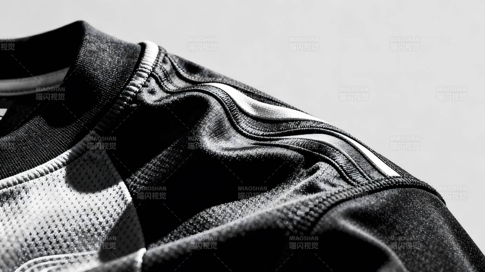 黑色运动服细节特写图片