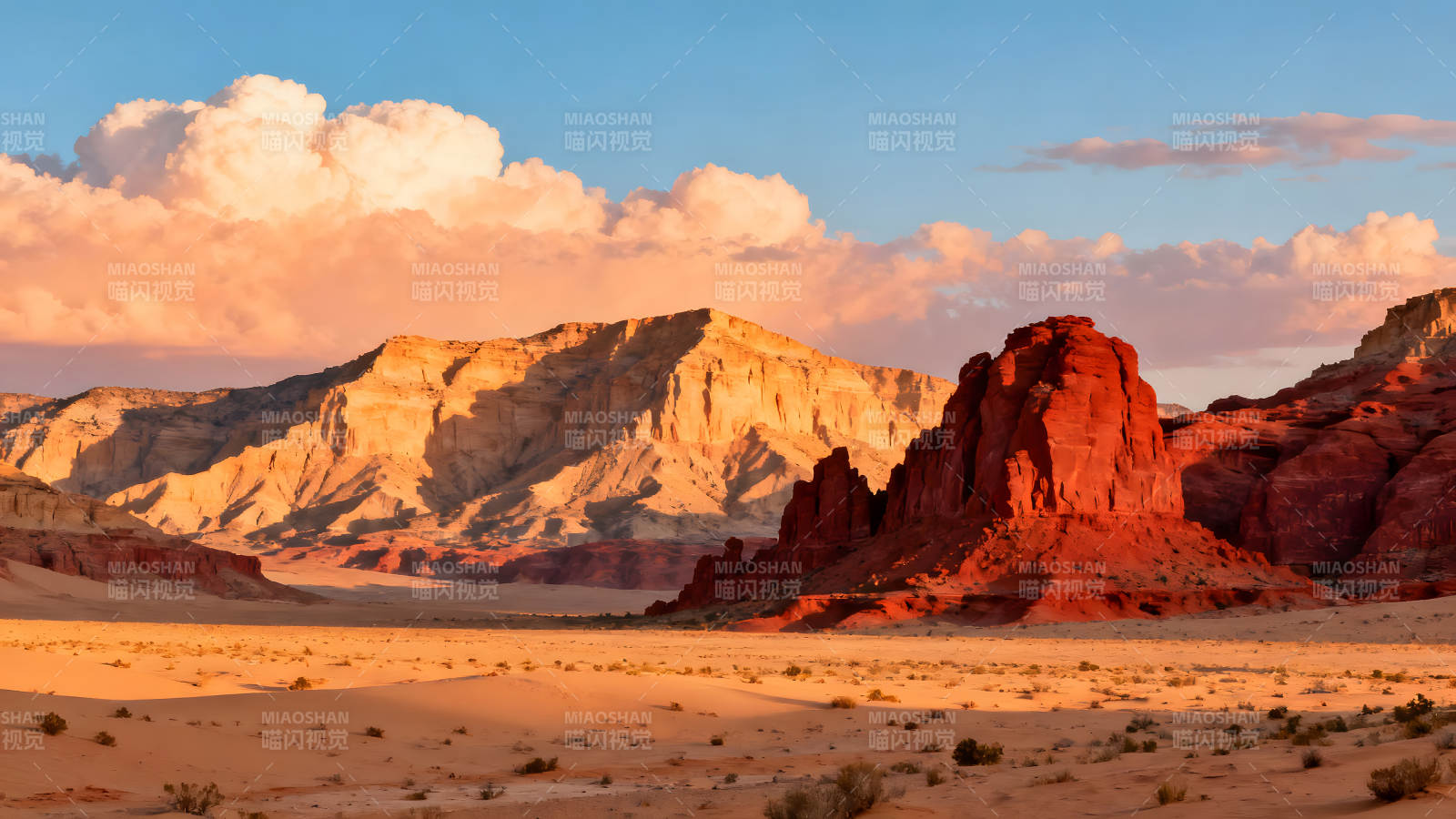 沙漠夕阳下的红岩地貌图片