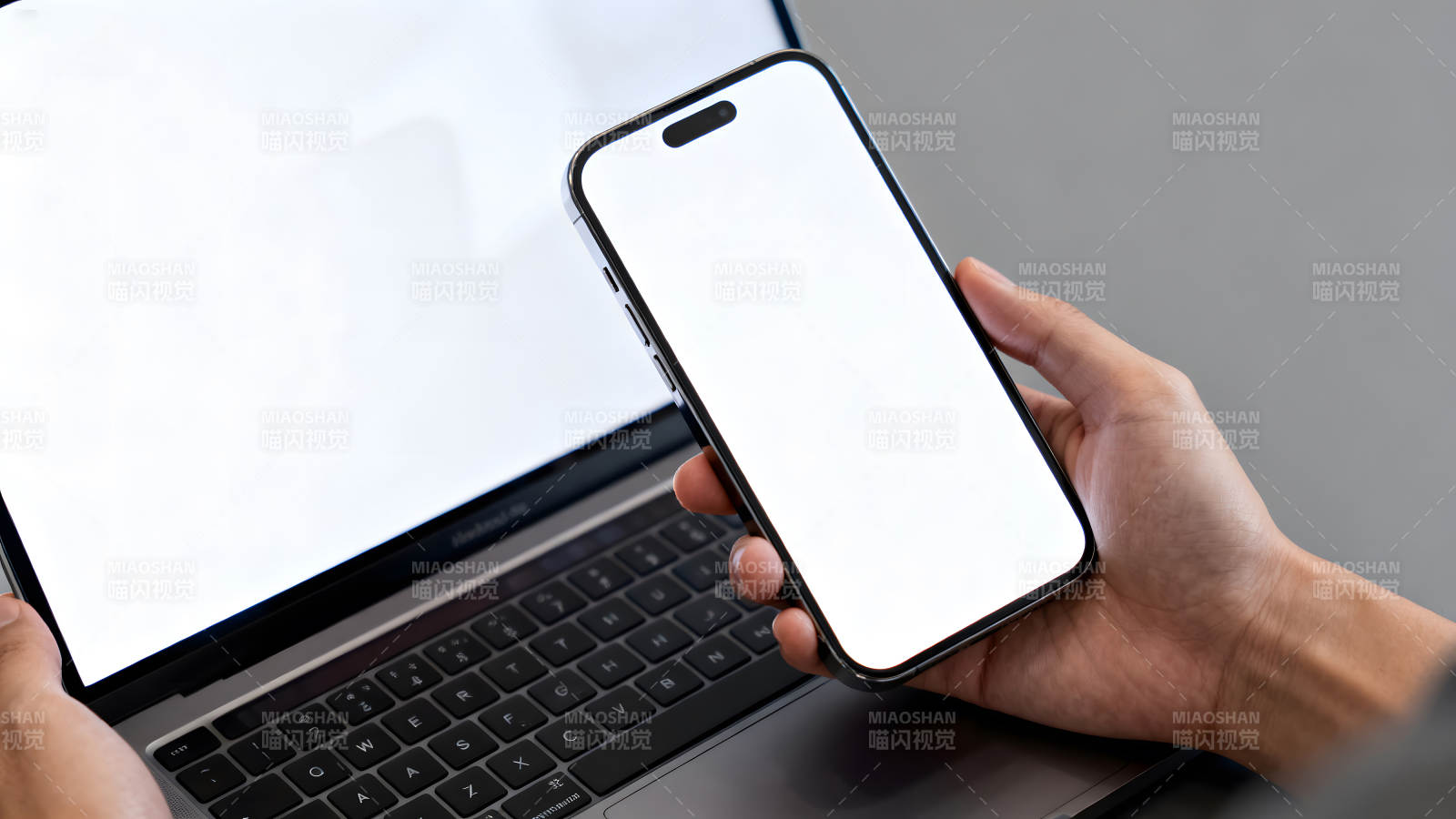 手机和笔记本电脑的特写镜头图片