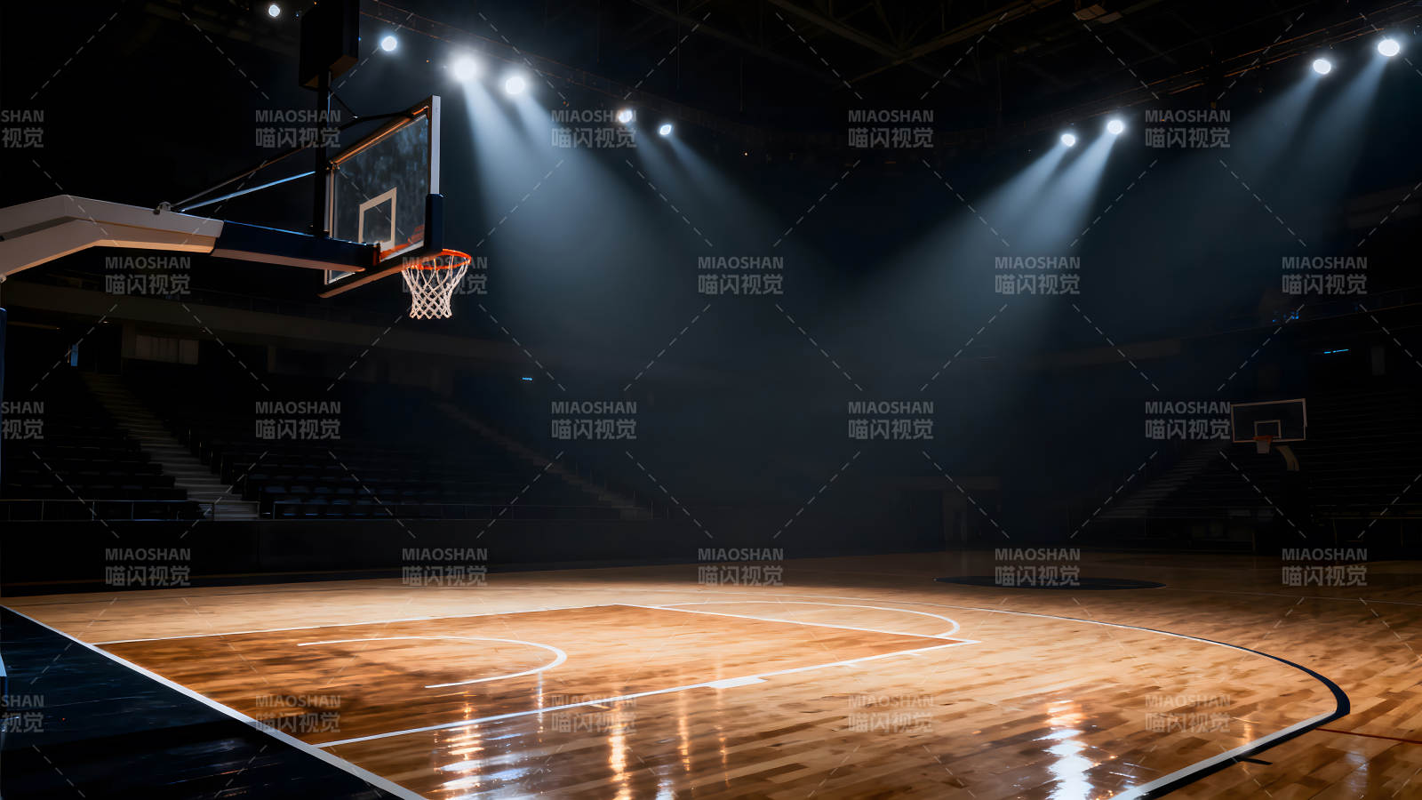 篮球场馆灯光下的木地板与球框图片