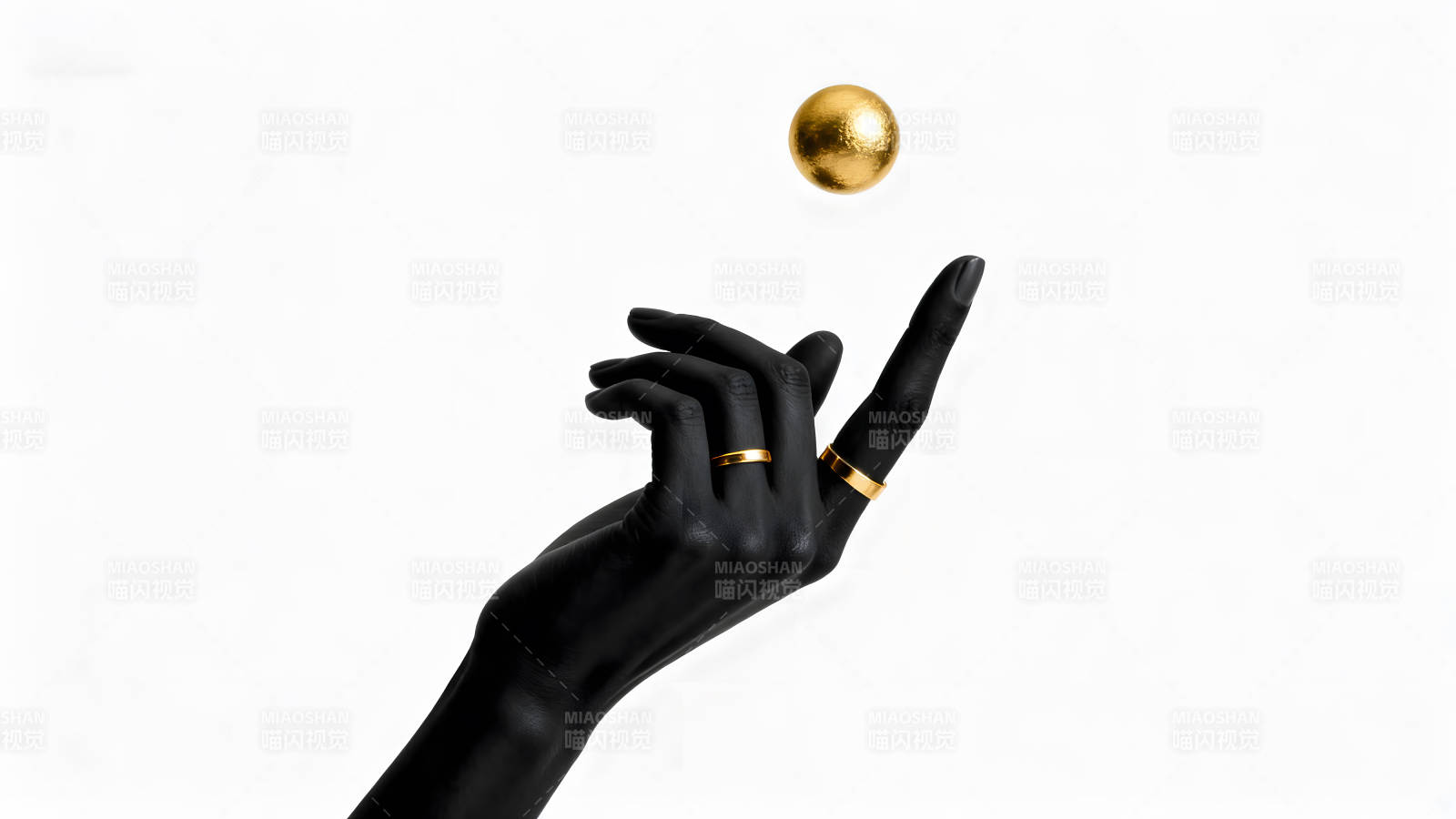 黑色手臂托举金色圆球图片