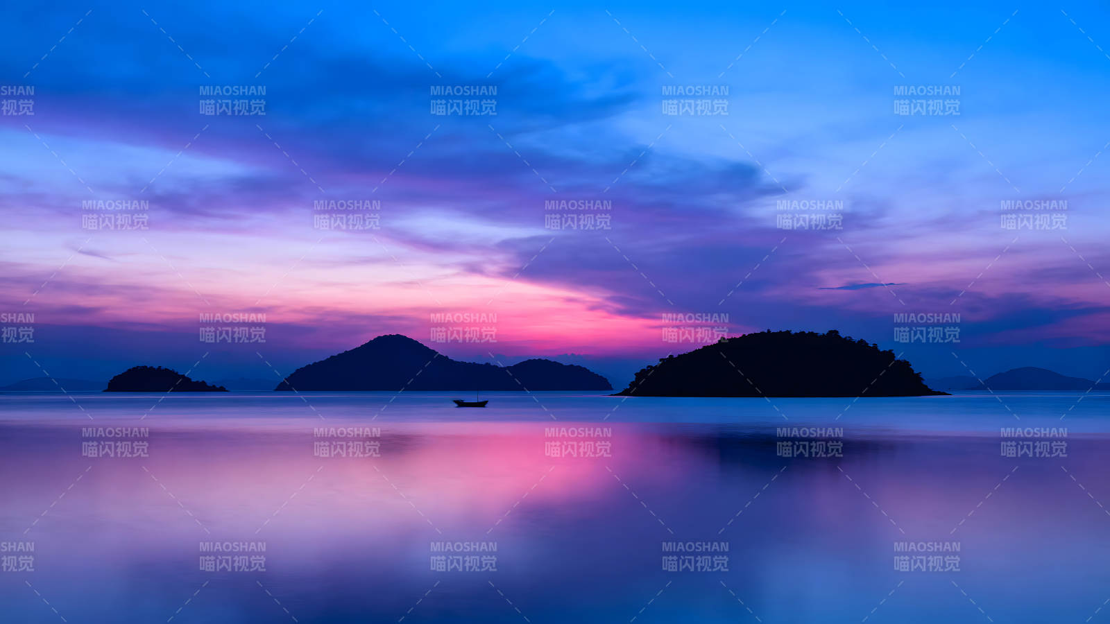 夕阳下海岛剪影静谧风景图片