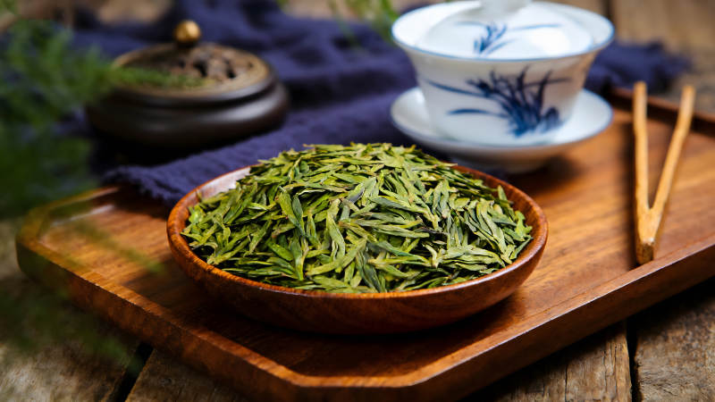 茶叶茶具木盘静物图片