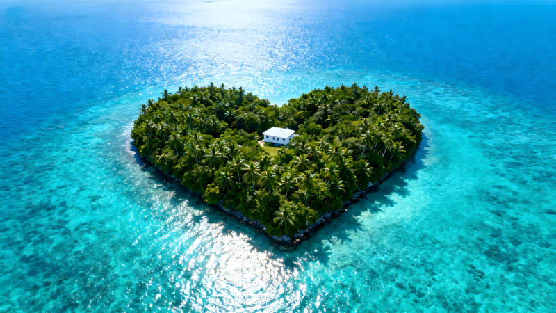 心形岛屿房屋碧海蓝天美景图片