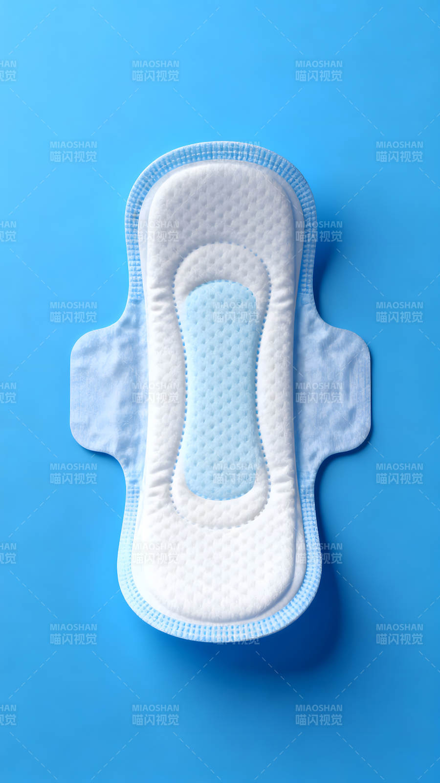 卫生巾特写蓝色背景衬托图片