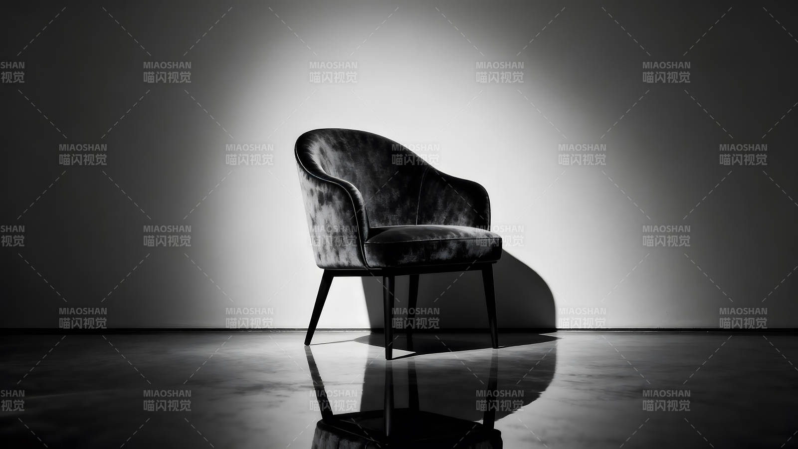 黑色扶手椅在光影下的艺术感图片