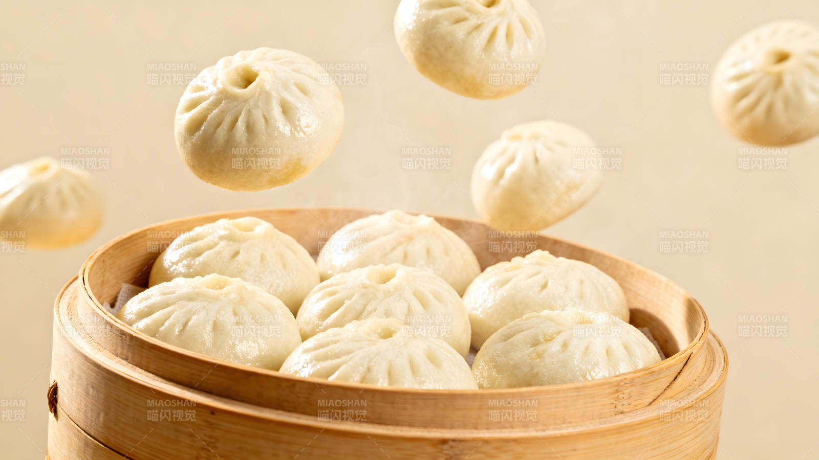 蒸笼里的包子和悬浮的包子图片