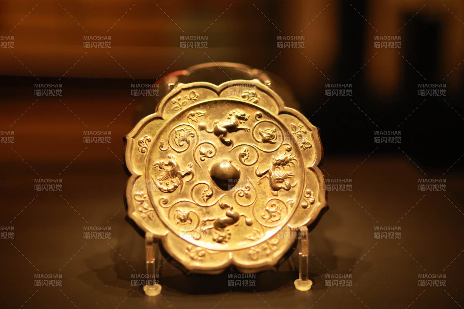 唐瑞兽鸾鸟花卉纹铜镜图片