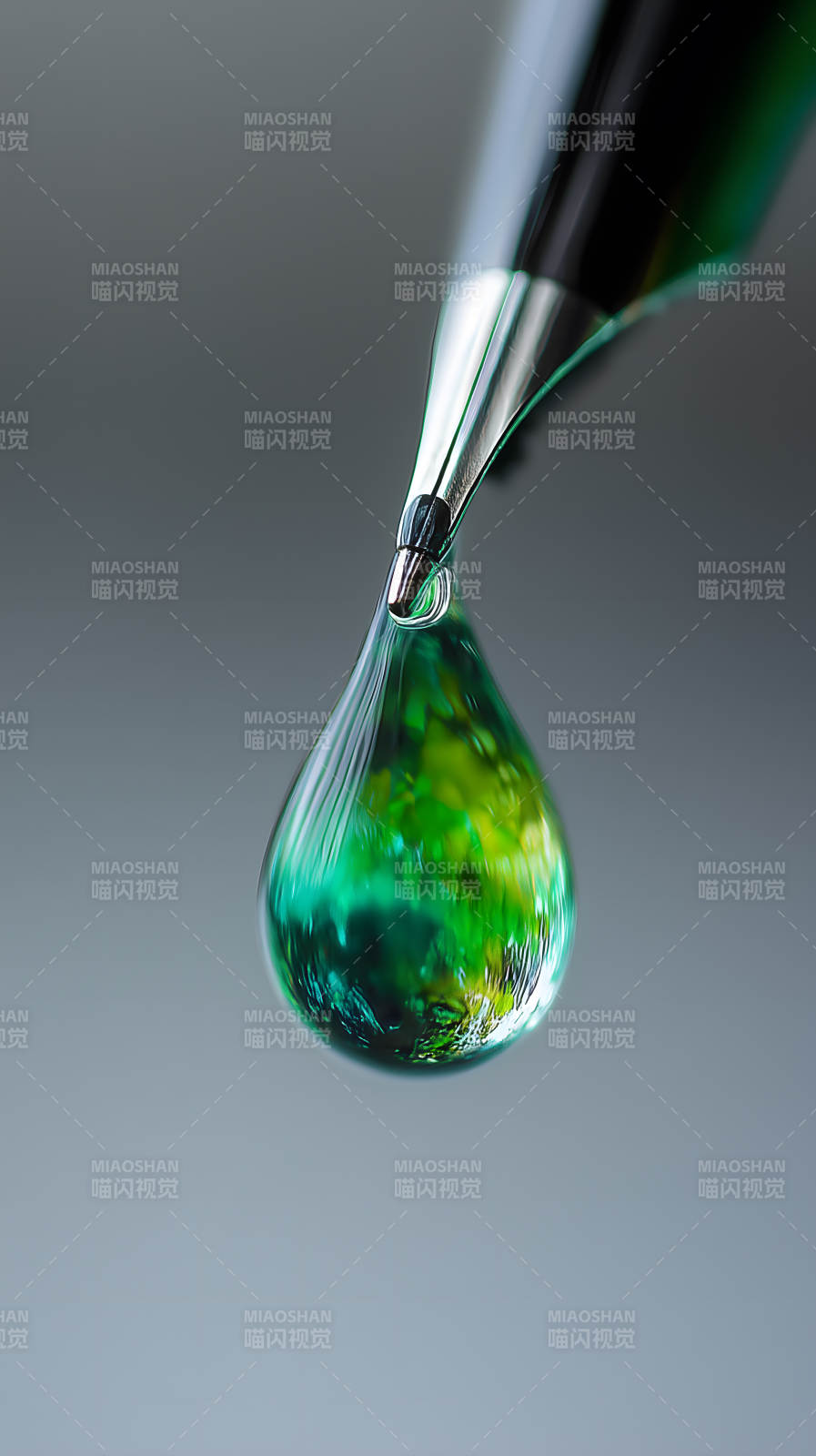 笔尖与水滴的光影交织图片