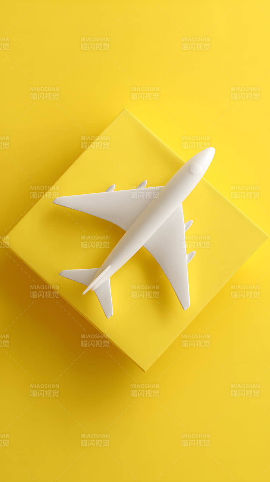 明黄背景上的白色飞机模型图片
