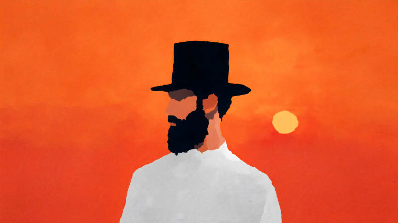 落日下戴礼帽的男子图片