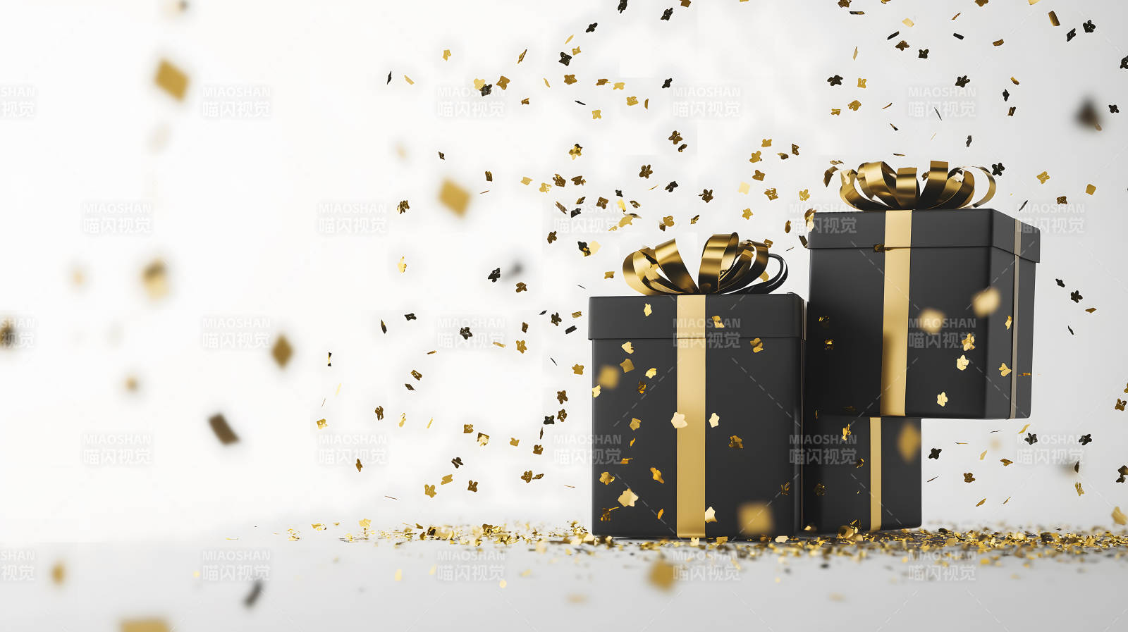 黑色礼盒与金色纸屑图片