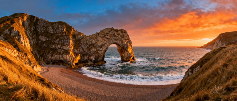 日落拱门海岸图片