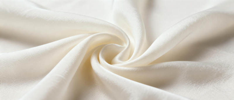 柔滑米白布料特写图片