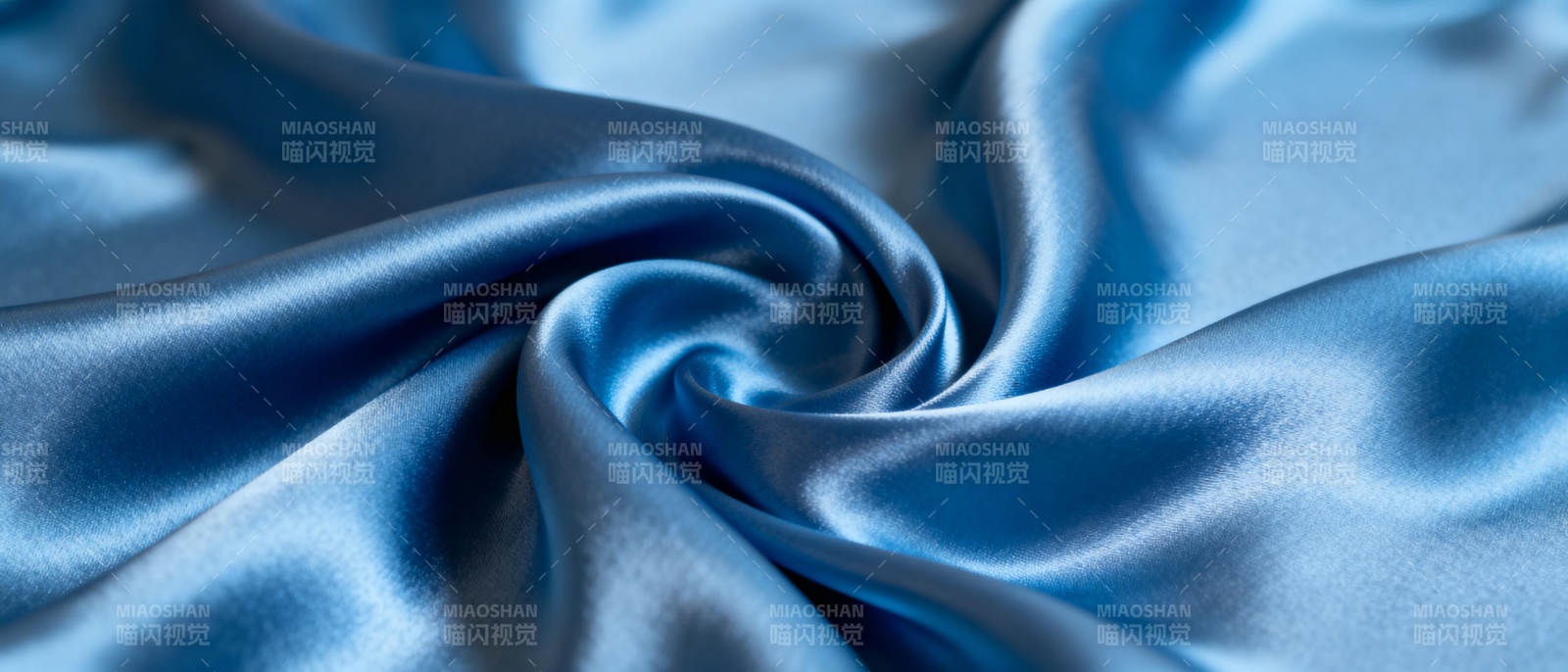 蓝色丝绸柔美褶皱图片