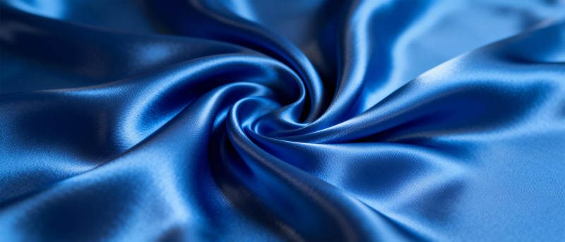 蓝色丝滑布料特写图片
