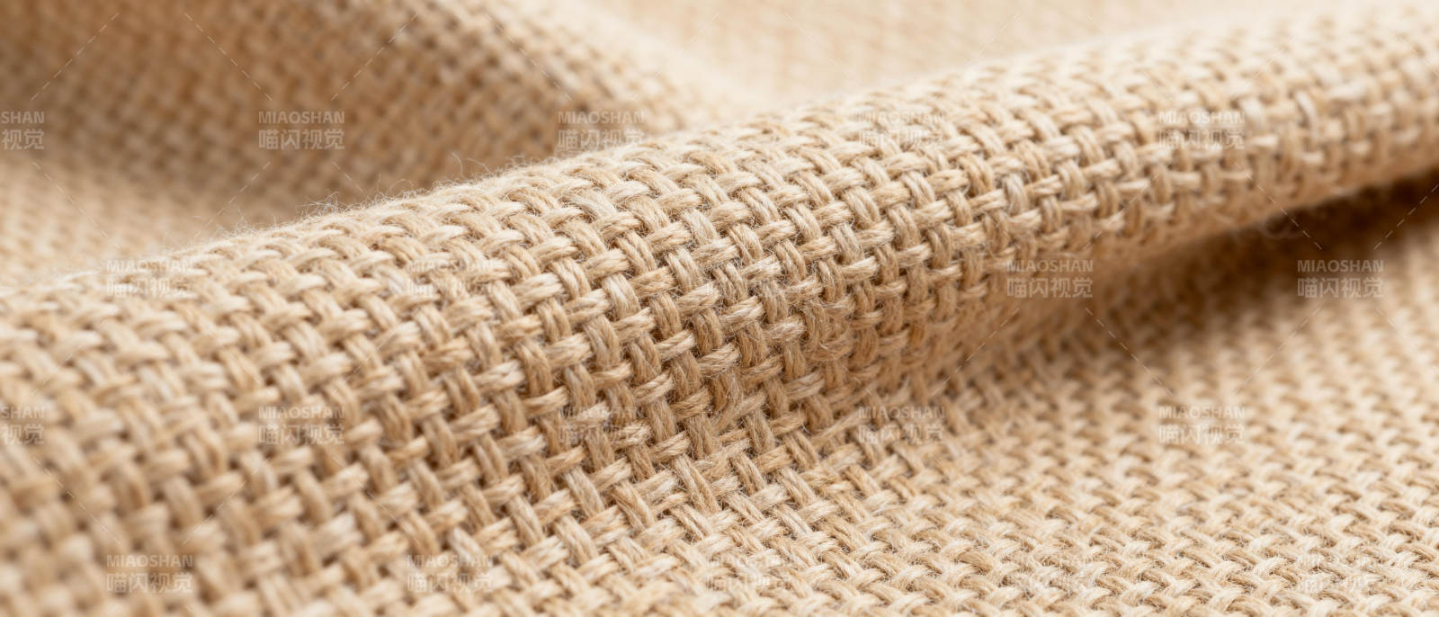 米色织物纹理特写图片