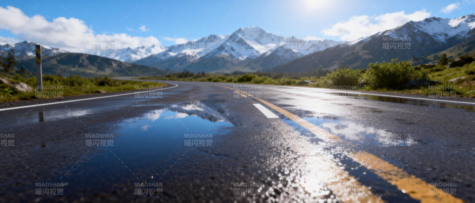 雨后山路映雪山图片