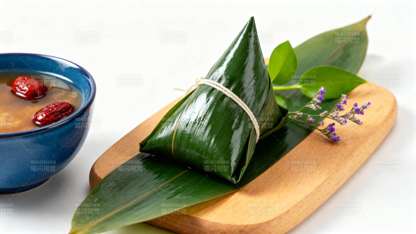 端午节粽子与红枣汤图片