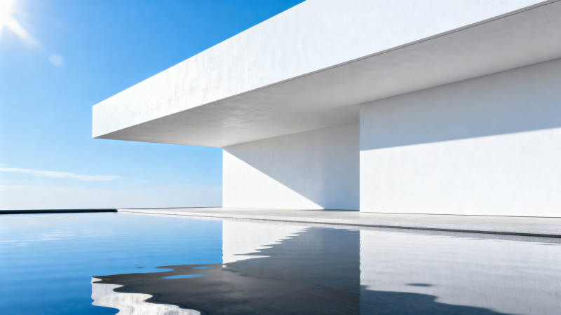 极简白色建筑与水面倒影图片