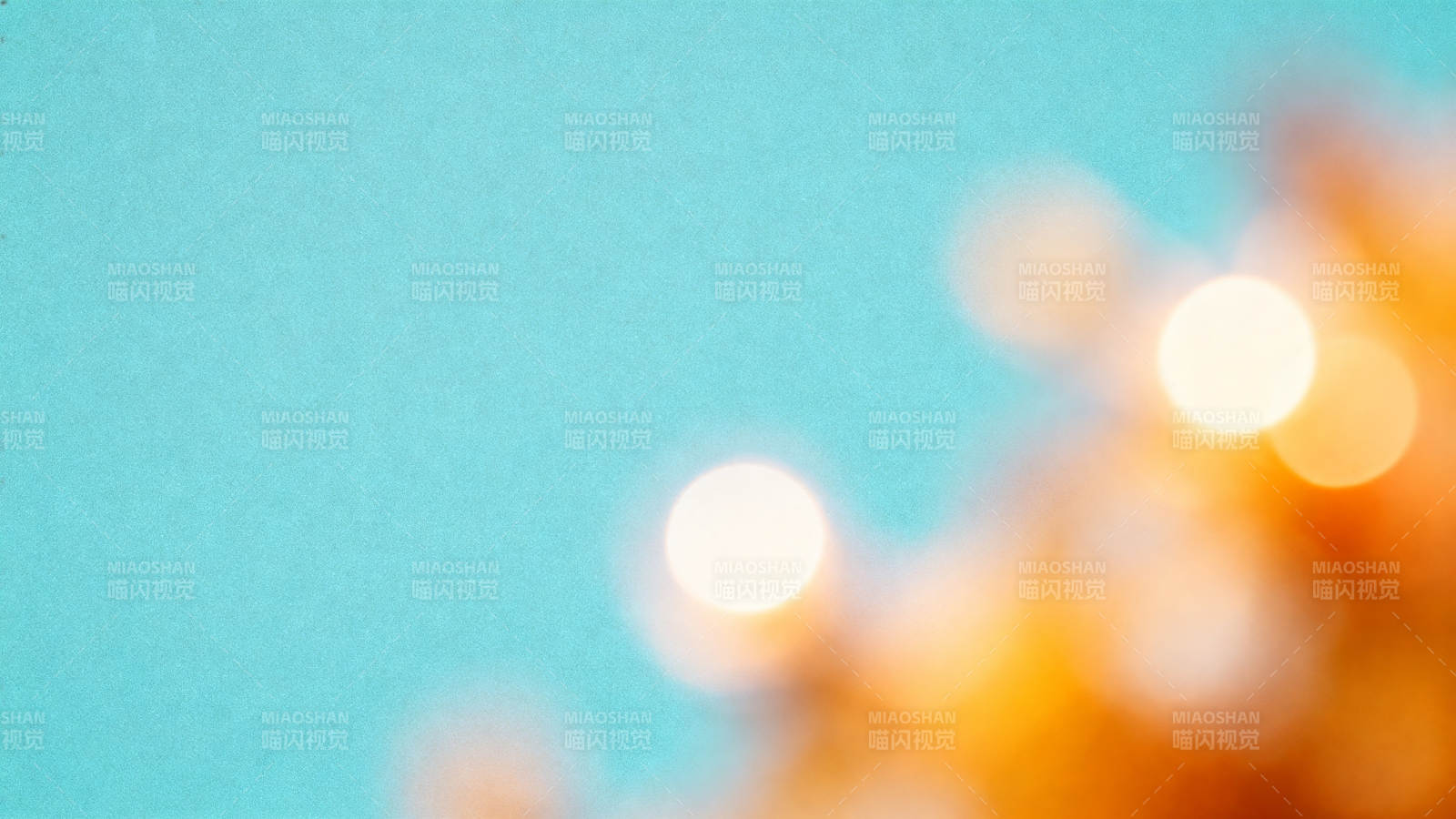 模糊光斑与蓝色背景图片