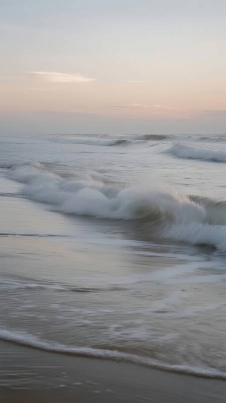 海边日落波浪图片