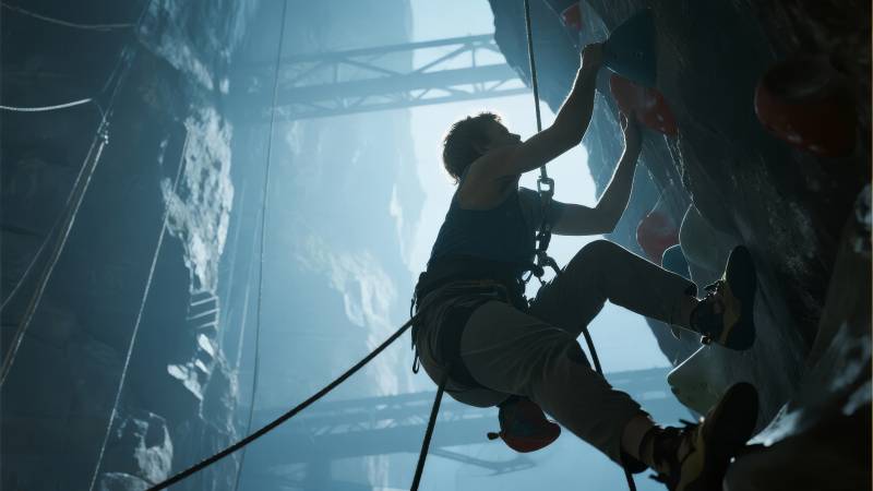 攀岩者挑战峭壁图片