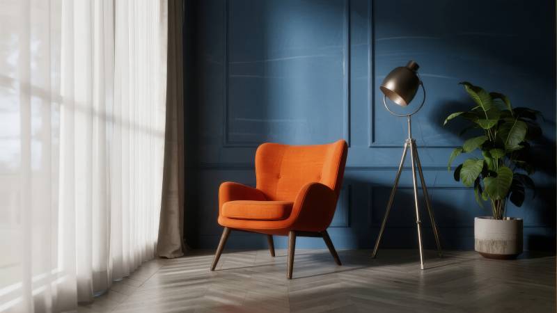 橙椅蓝墙静谧角落图片