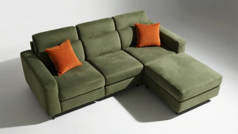 绿色沙发配橙色抱枕图片