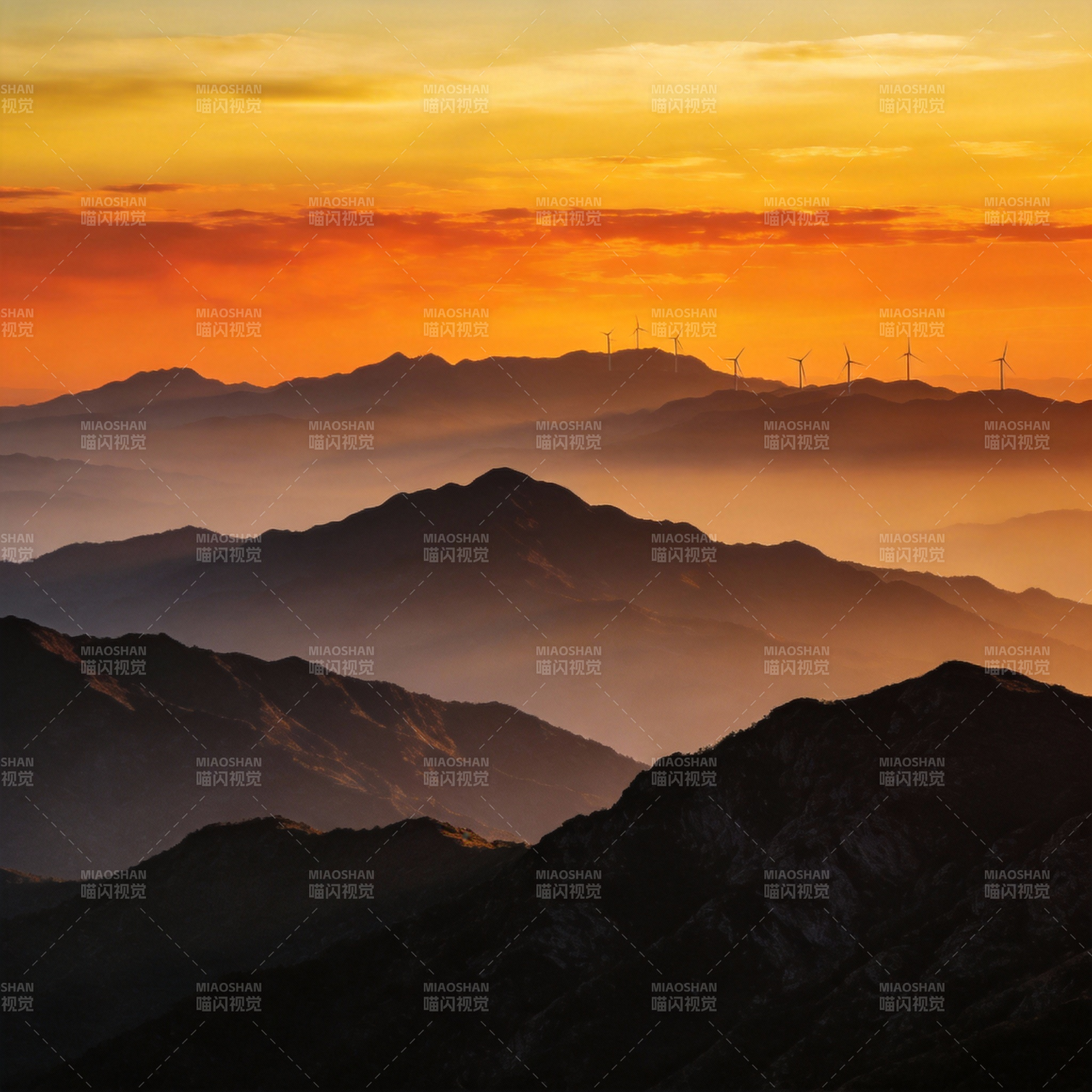山峦日落风车影图片