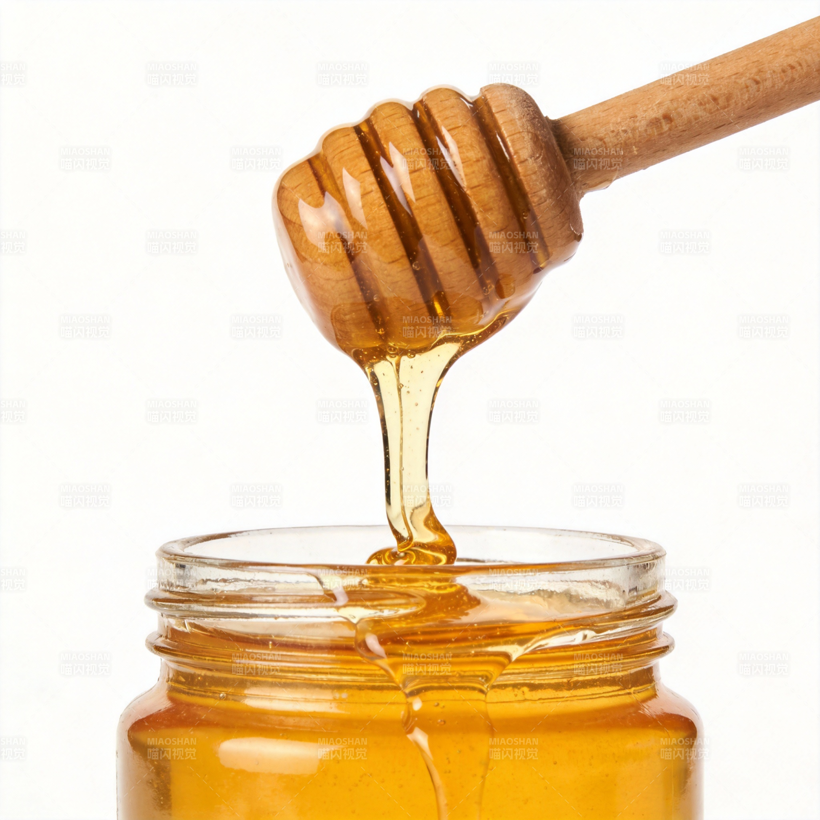 蜂蜜滴落瞬间图片