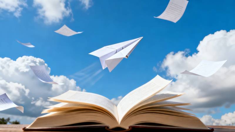 书页飞向蓝天图片
