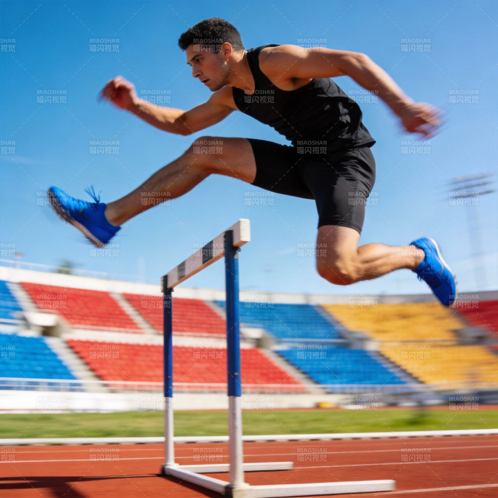跨栏运动员飞跃瞬间图片