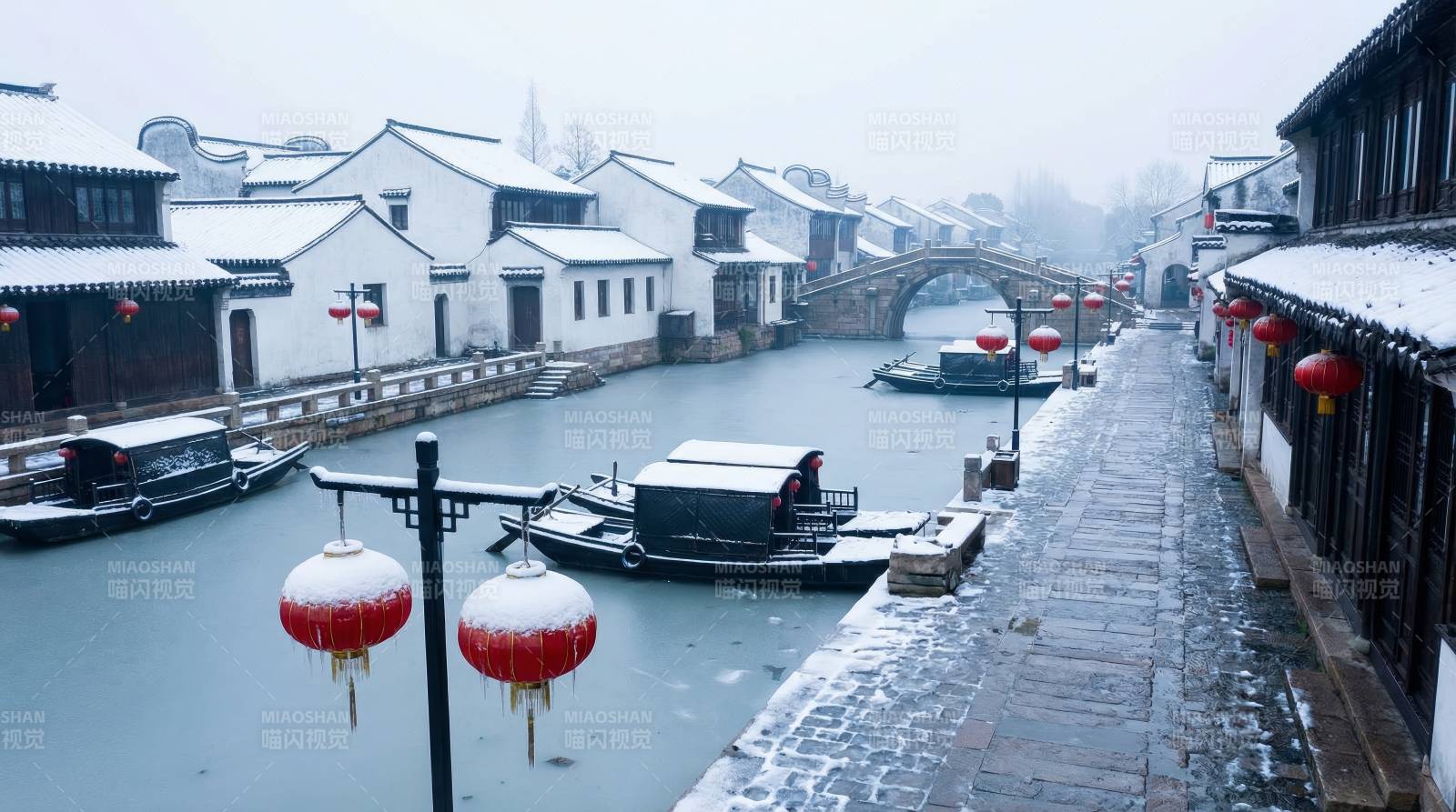 雪中古镇水乡景图片