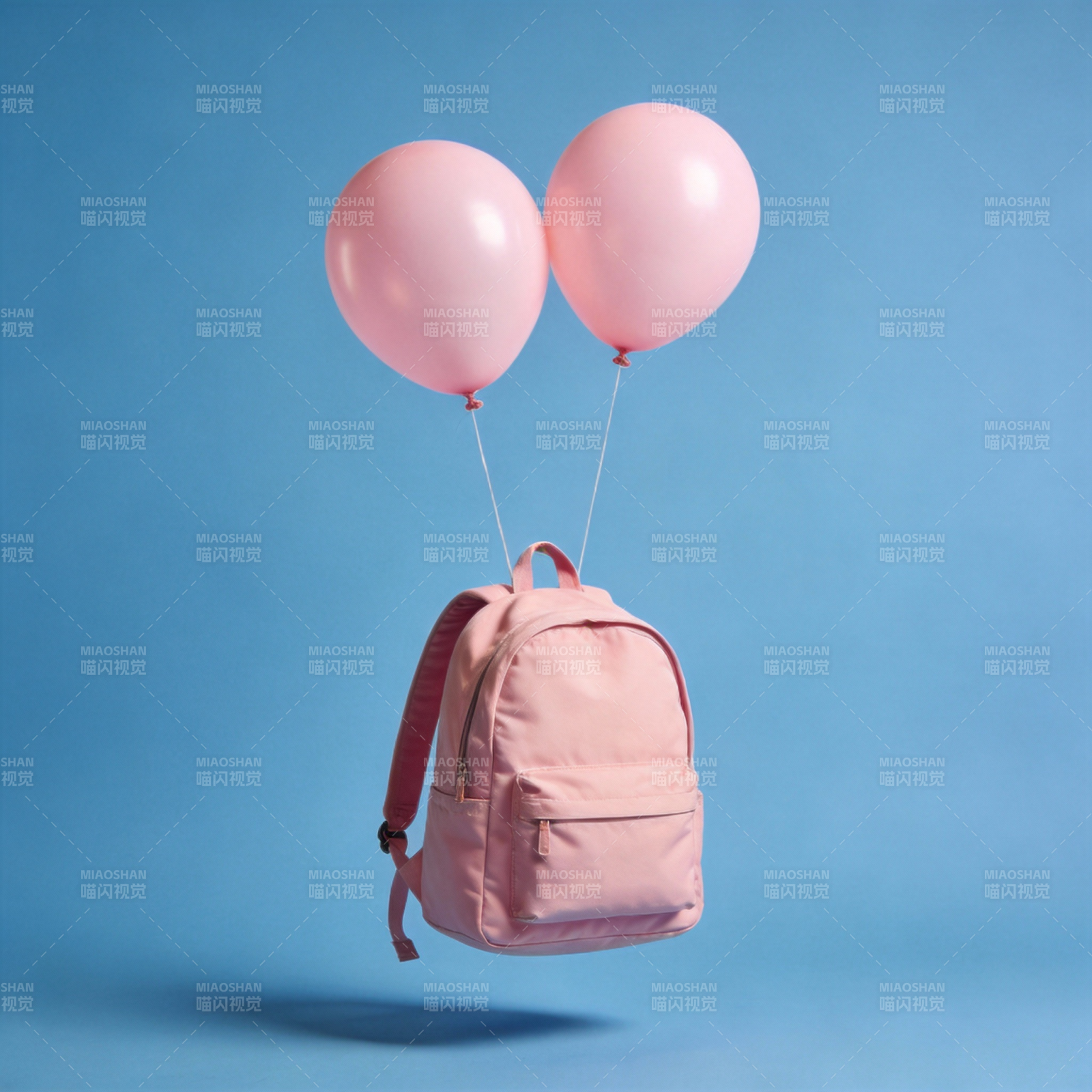 粉色书包飘浮气球图片