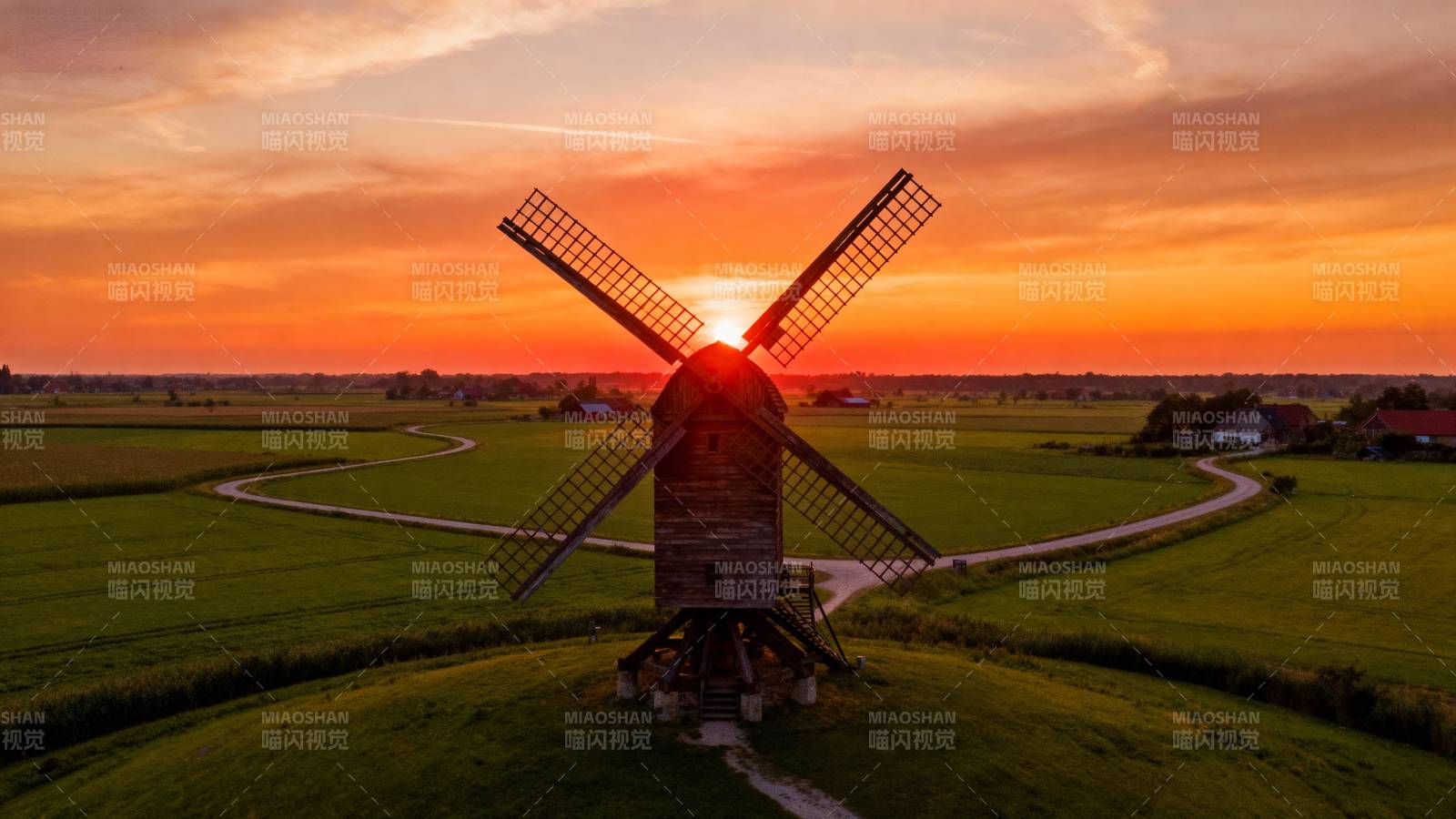 风车日落美景图片