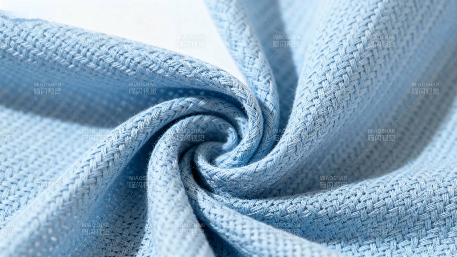 浅蓝织物纹理特写图片