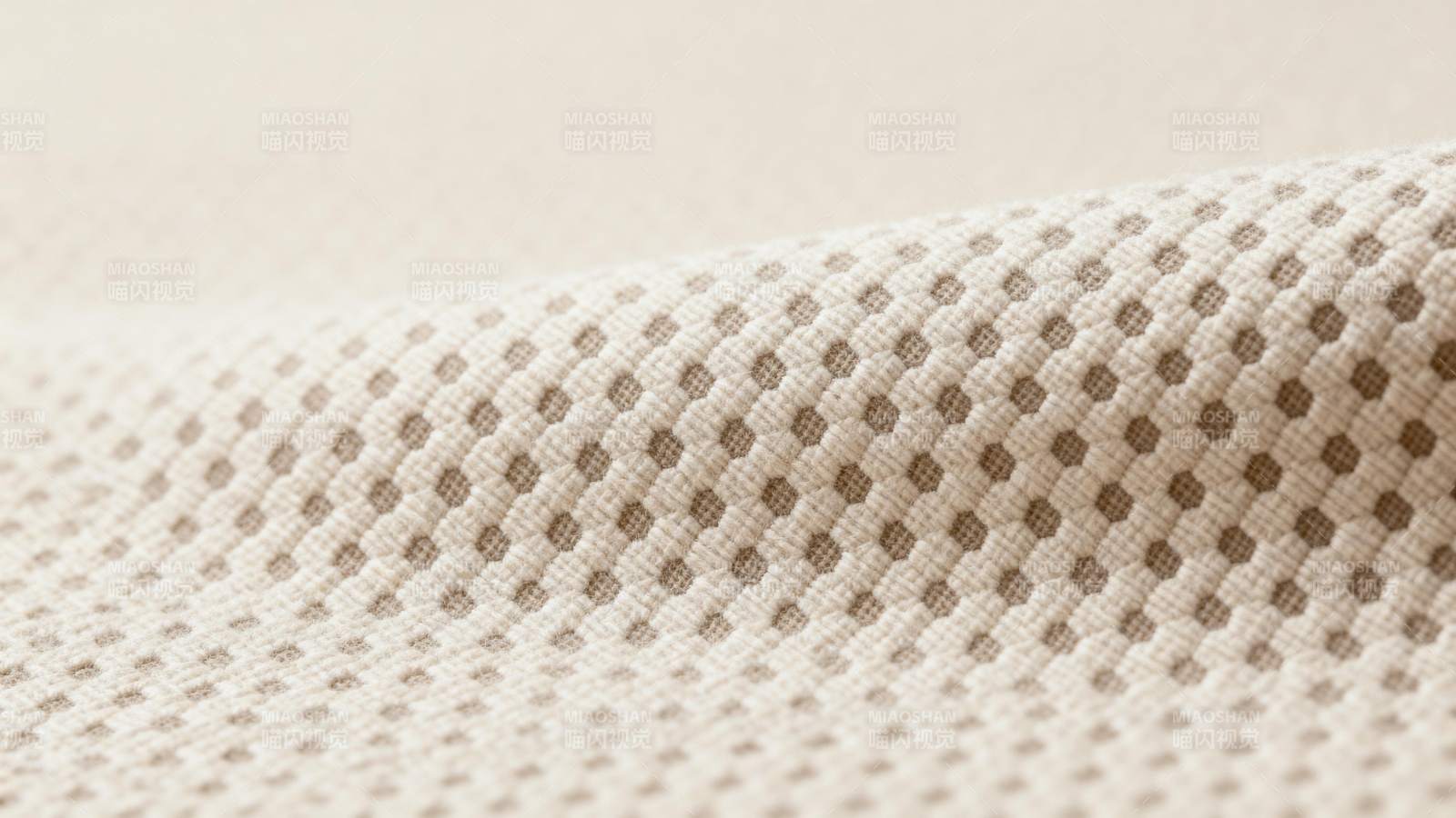 米色网眼布料特写图片