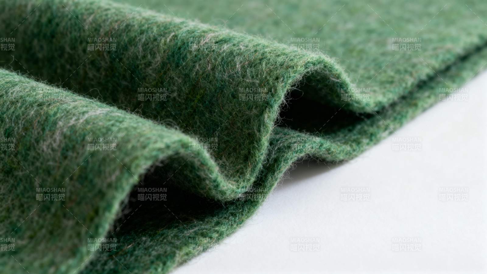 深绿毛毡纹理特写图片