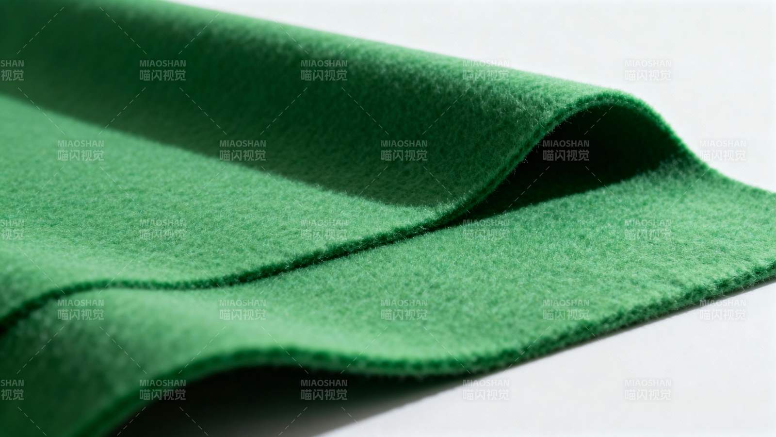 绿色布料特写图片